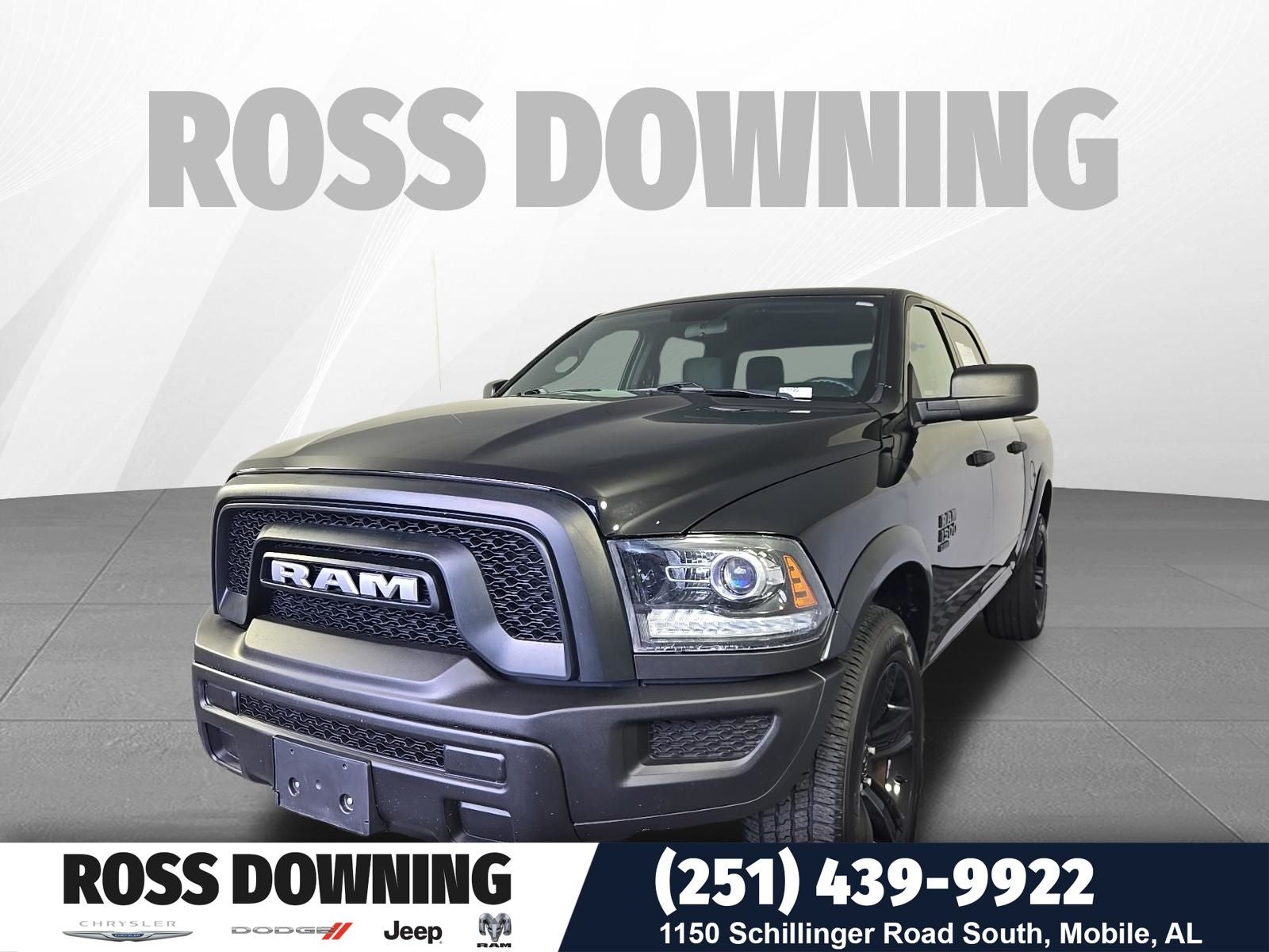 2024 RAM 1500 Classic Warlock in Diamond Black Crystal Pearlcoat — front three-quarter view